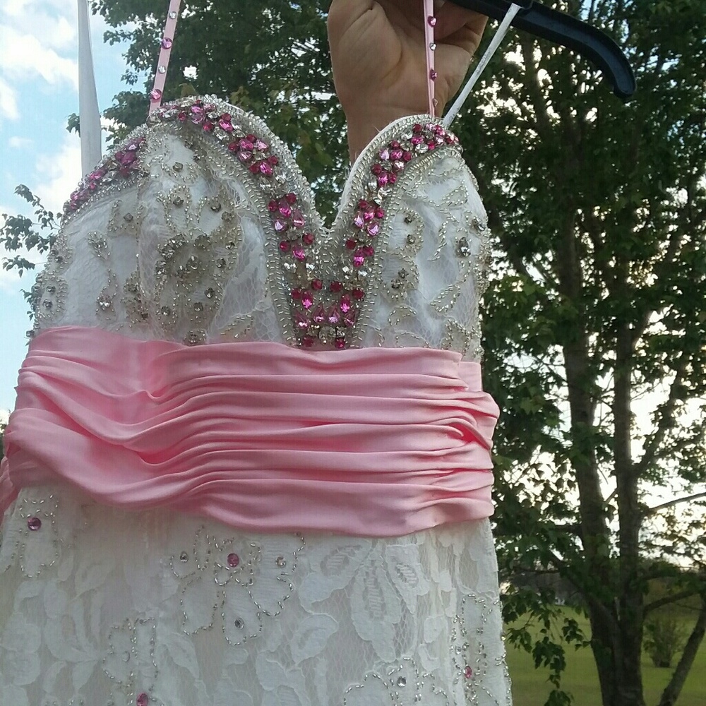 White pageant Dress With Pink and white stones.